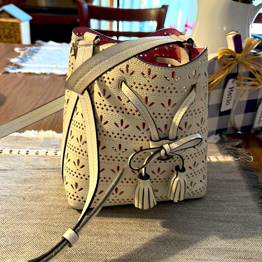 White mesh Kate Spade handbag with fringe accent!